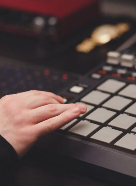 man in the studio creates electronic music